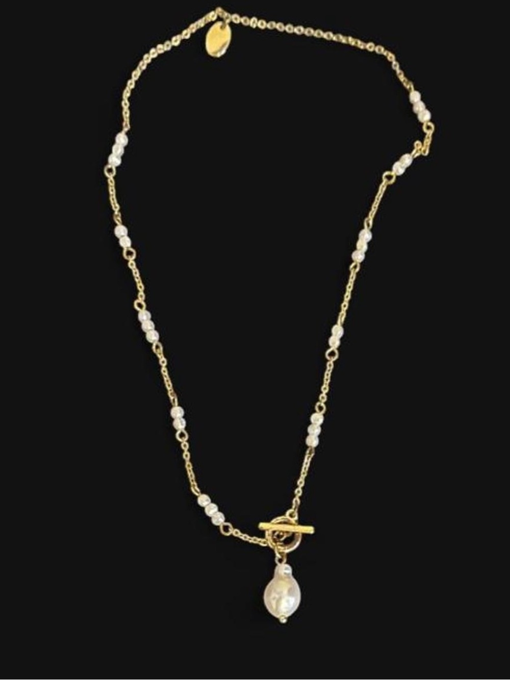 aerie gold-Tone Necklace with Branded pearl like charm and beads. Costume
